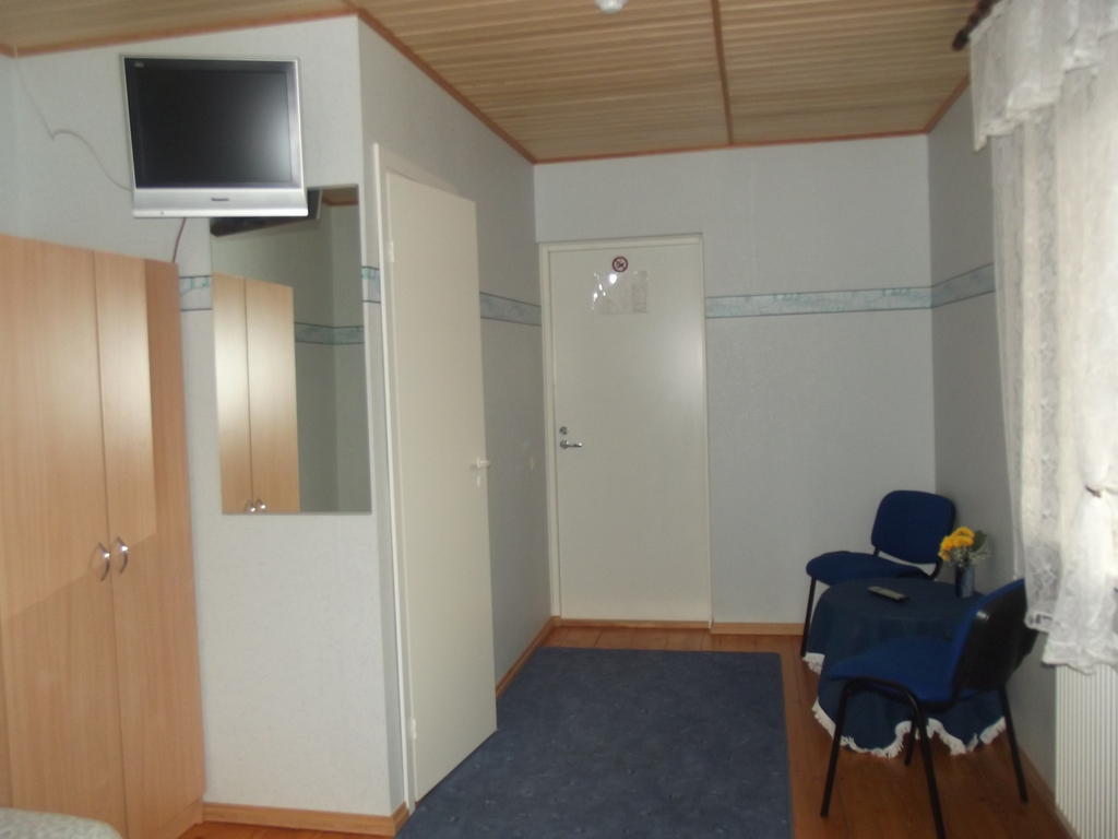 Kure Guesthouse Rahinge Pokoj fotografie